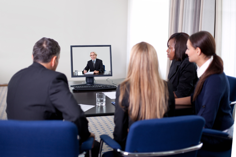 http://www.dreamstime.com/royalty-free-stock-photography-businesspeople-video-conference-image21805117