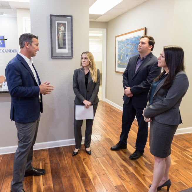 Tampa attorney Jeff Lieser speaks with board certified lead real estate attorney Joleen East Nelson at thier office in Tampa, FL.